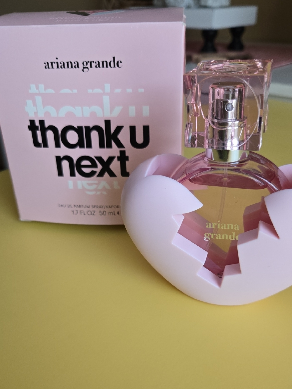 Ariana Grande pink heart perfume bottle with box